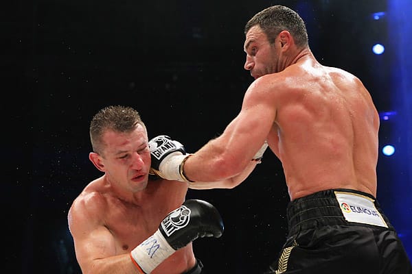 Tomasz Adamek (left) took some time off from boxing to sharpen his game. (Boris Streubel/Getty Images)  